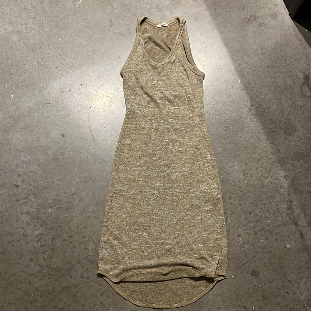 Midi length stretchy dress with open back slit